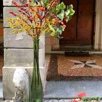 composizione di fiori "l'autunno in bottiglia"