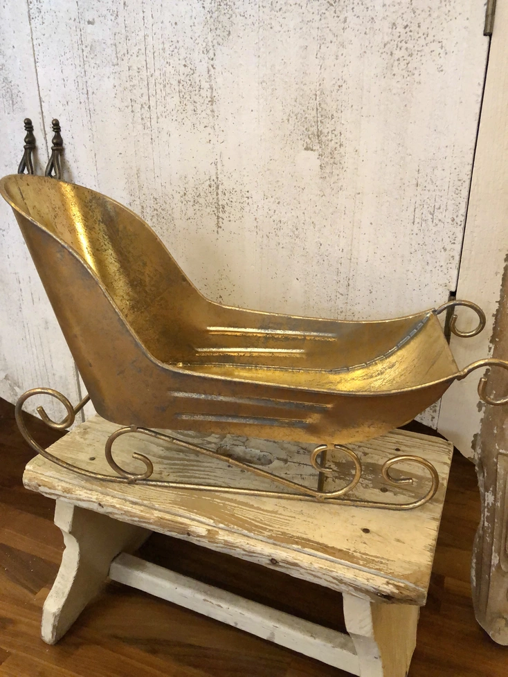 slitta di babbo natale oro