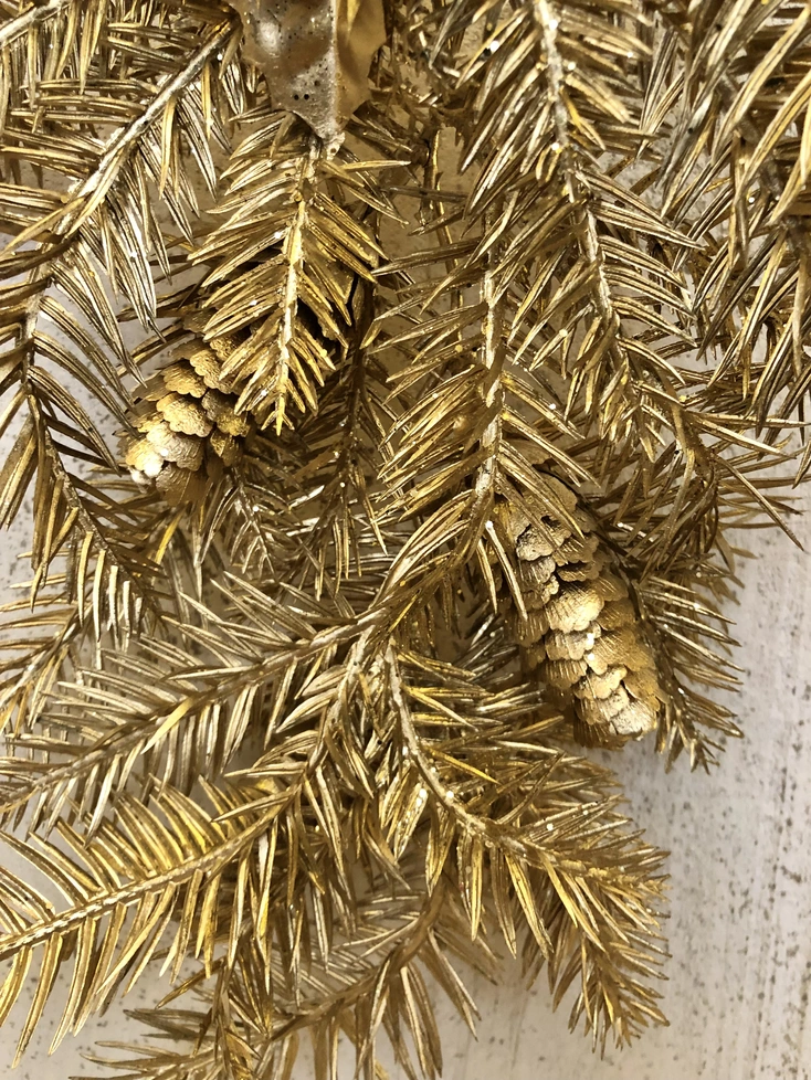 Decorazione natalizia da porta rami dorati